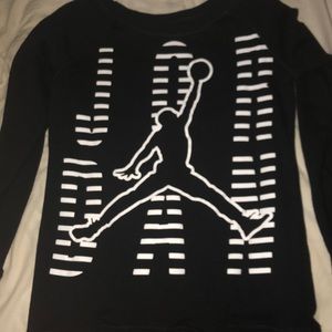 An woman’s Jordan long sleeve shirt